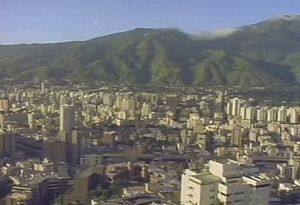 View Caracas, one of South America's principal cities, and learn about challenges it faced in the 1990s